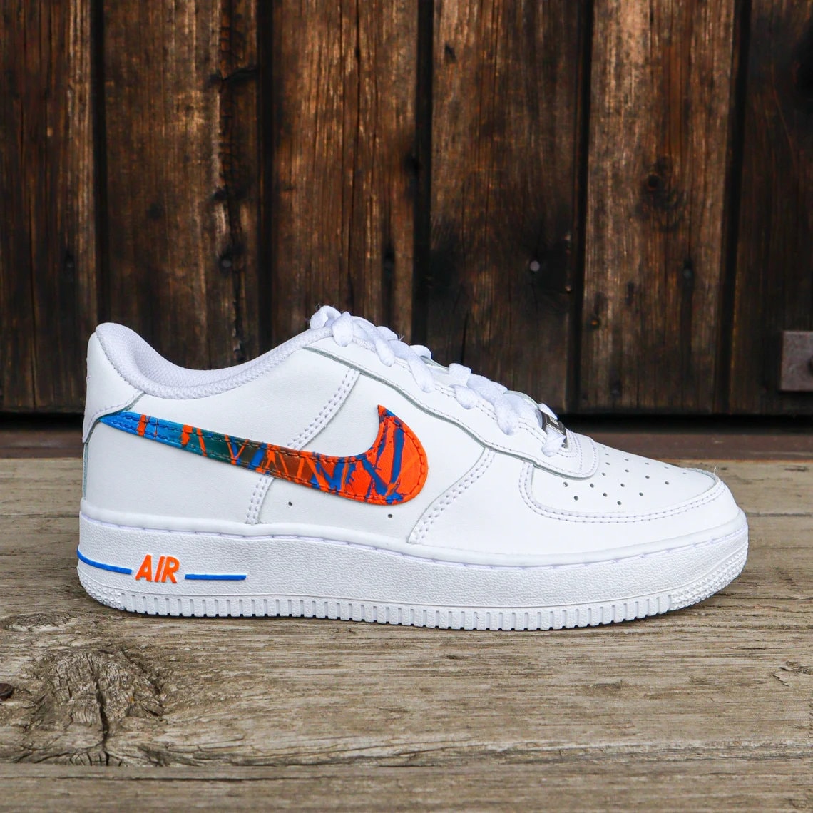 Orange swoosh air force 1 deals
