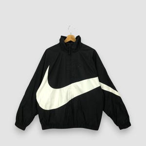 nike big swoosh tracksuit