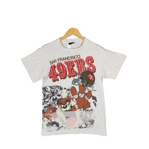 Vintage 49ers San Francisco X Tazmania Tshirt des années 90 San Francisco 49ers Rugby Shirt petit t-shirt gris dessin animé Warner Bros Tazmania, taille S