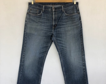 W40 Vintage Levi's Cut-Off Jeans 90er Jahre Levis Damen Hohe Taille Hose Levis Faded Blau Light Wash zierlich Denim Levis Mom Jeans Größe 40x29