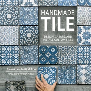 May include: A book cover titled "HANDMADE TILE" with the subtitle "DESIGN, CREATE, AND INSTALL CUSTOM TILES." The cover features a grid of blue and white patterned tiles. A hand is holding one of the tiles. The author's name is Forrest Lesch-Middelton.
