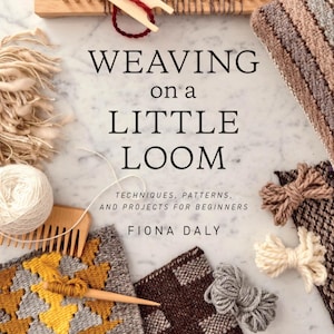 May include: The book titled Weaving on a Little Loom by Fiona Daly features a cover with the text Techniques, Patterns, and Projects for Beginners. Surrounding the title are various weaving tools, a wooden loom, yarn balls, and woven fabric swatches.