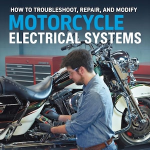 May include: A person working on a motorcycle's electrical system, using a multimeter. The image features a chrome and white motorcycle with the text "HOW TO TROUBLESHOOT, REPAIR, AND MODIFY MOTORCYCLE ELECTRICAL SYSTEMS" in blue and white.