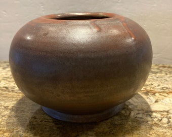 Stunning pottery bowl with metallic glaze signed by artist