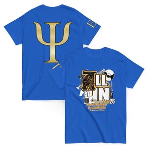 May include: Two blue t-shirts. The front shirt has a gold symbol and the back shirt has a gold design with the text "LL IN" and "Where There's UNITY There's STRENGTH". The number "26" is also visible.