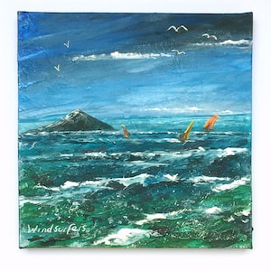 May include: A painting of a seascape with three windsurfers in the water. The sky is blue with white clouds and there are seagulls flying overhead. The water is a deep blue with whitecaps. The painting is signed "Windsurfers" in the bottom left corner.