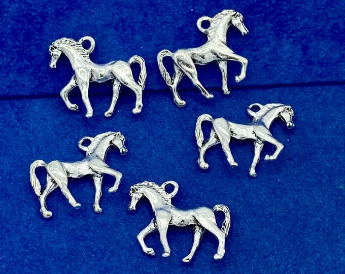 A Silver Herd of Large Horses Charm and Pendants - Set of Five