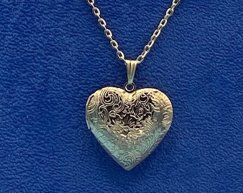 Pale Gold Heart Shaped Photo Locket Floral Engraved Pattern complete with Pale Gold Necklace.