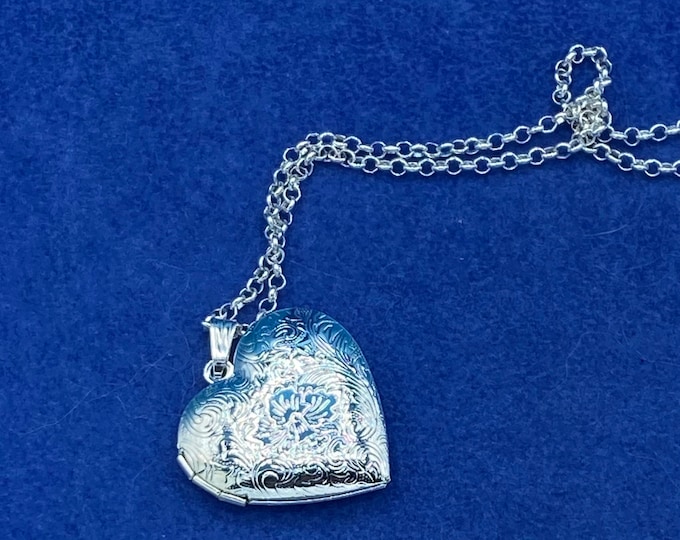 Bright Silver Heart Shaped Photo Locket Detailed Floral Engraved Pattern complete with Silver Necklace.
