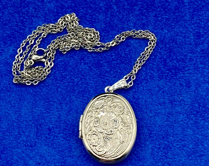 Silver Stainless Steel Oval Photo Locket with a Traditional Art Nouveau Floral Design with Necklace.