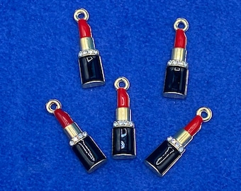 Set of Five Lovely Lipsticks in Gold, black and red enamel with Diamanté detail Charms and Pendant.