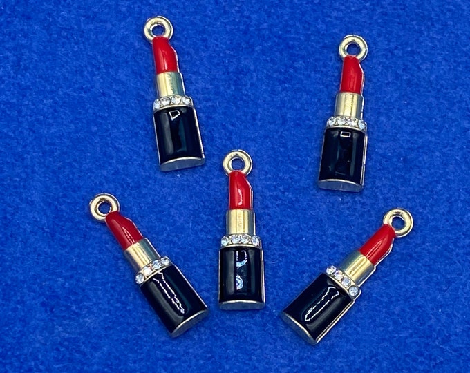 Set of Five Lovely Lipsticks in Gold, black and red enamel with Diamanté detail Charms and Pendant.