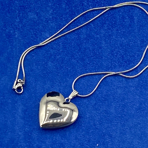 Bright Silver Heart Shaped Photo Locket with Silver Necklace.