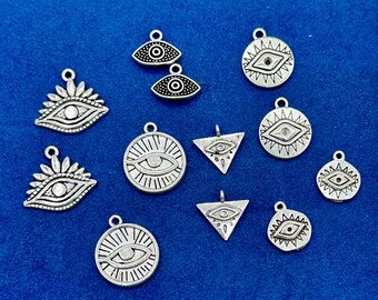Mixed lot of Silver Evil Eye Protection Charms - Set of Twelve.
