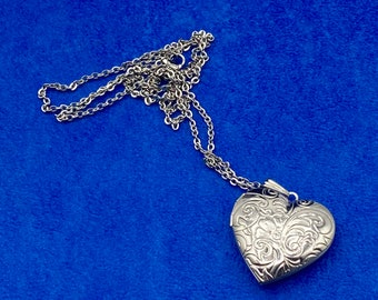 Silver Heart Shaped Photo Locket, Polished Stainless Steel Floral Engraved Pattern with Silver Necklace.