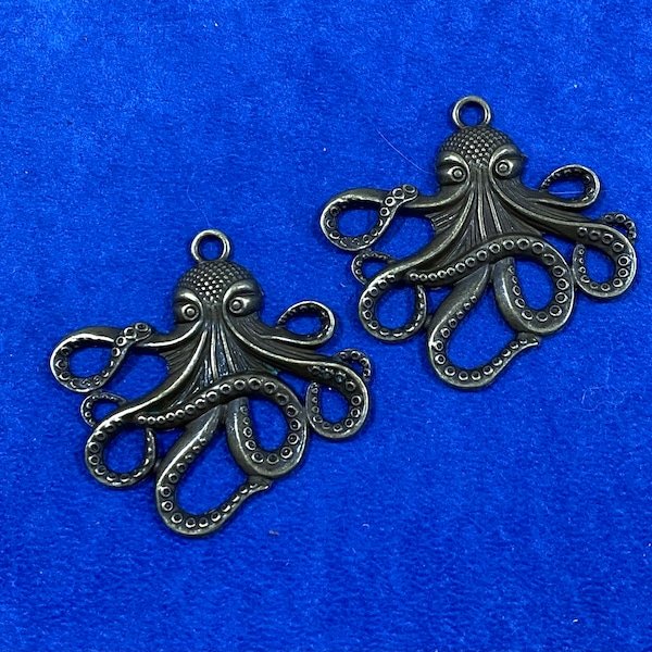 Grote antiek bronzen octopushanger ~ set van twee