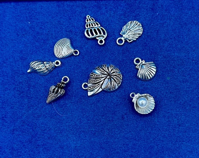 A mixed set of Silver Seashells, Clam Shells and Nautilus Shell Charm Pendant ~ Set of Eight
