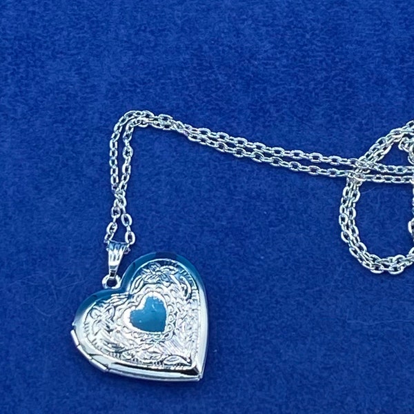 Silver Heart Shaped Photo Locket with Floral Pattern Edge complete with Silver Necklace.