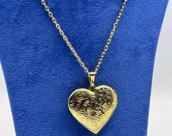 Yellow Gold Heart Shaped Photo Locket Floral Engraved Pattern complete with Gold Necklace.