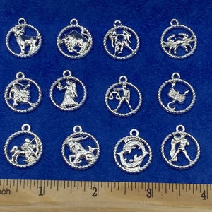 Zodiac Sign Charms: Bright Silver Cutout Medallions - Set of 12