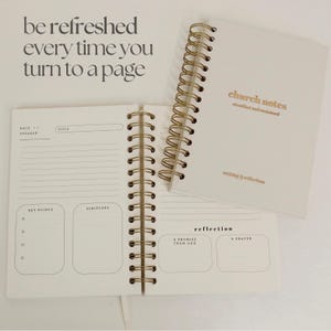 May include: Cream-coloured spiral-bound notebook with gold lettering reading "church notes" and "writing & reflection." The open notebook shows lined pages with sections for notes, scripture, and reflection. The text "be refreshed every time you turn to a page" is at the top.