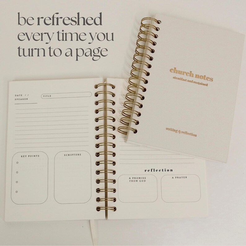 May include: Cream-coloured spiral-bound notebook with gold lettering reading "church notes" and "writing & reflection." The open notebook shows lined pages with sections for notes, scripture, and reflection. The text "be refreshed every time you turn to a page" is at the top.