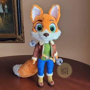 A plush Jad fox dog toy stuffed animal by drawing picture cartoon character polar arctic fox dog