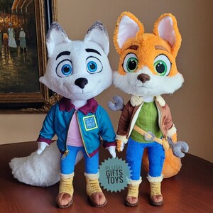 2 plush toys foxes by characters of cartoon polar arctica dogs