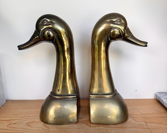 Sujetalibros antiguos de latón con forma de cabeza de pato de 24 cm de altura.