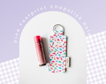 Dino Footprint Print Chapstick / Lippenbalsam Halter Schlüsselanhänger - Dino Fußabdruck Kunstleder Schlüsselanhänger - Dinosaurier Print Geschenk, Lippenbalsam Schlüsselband