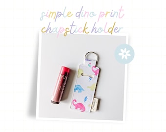 Einfacher Dinosaurier-Schlüsselanhänger / Lippenbalsamhalter mit Dino-Print - Einfacher Dinosaurier-Kunstleder-Schlüsselanhänger