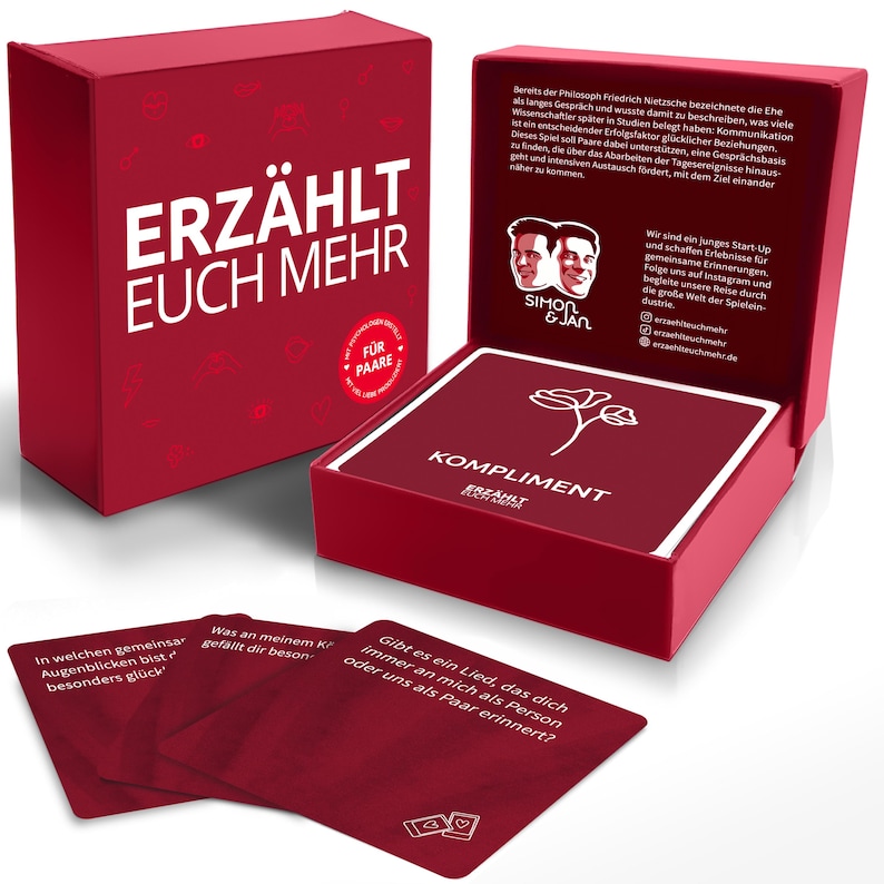 May include: Red box with the text "ERZ&Auml;HLT EUCH MEHR" and "F&Uuml;R PAARE" on the front. The box contains a deck of cards with the text "KOMPLIMENT" on the front. The cards have questions for couples to discuss.