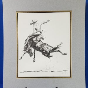 James va-t-il imprimer « Cowboy on a Bucking Bronc »