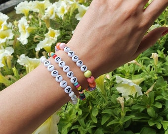 One-size-fits-all colored stretch bracelets, customizable with name