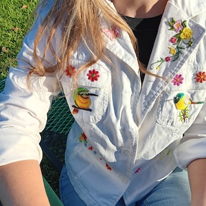 Embellished white cotton jacket with embroidery accents