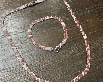 Lovely purple and cream snake skin necklace and bracelet set. Velvety chain!
