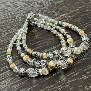 Stunning multi strand 925 beaded bracelet with gold and crystal details!