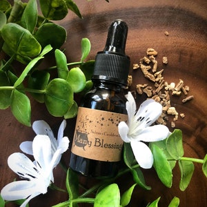 Many Blessings Oil - Herb/Flower/Crystal Blend - Organic Almond Oil/Vitamin E Oil/Essential Oil Blend - 15ml Clear Glass Bottle