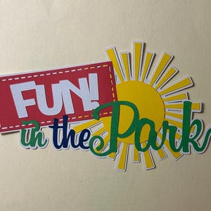 Título de álbum de recortes Diversión en el parque Papel hecho a mano Troquelado perforado Parque de atracciones