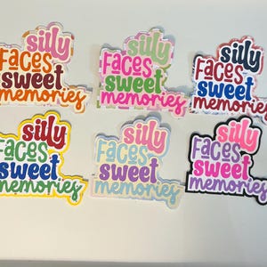 May include: A collection of colorful die-cut stickers with the words "silly faces sweet memories" in various fonts and color schemes. The stickers are in shades of pink, blue, green, yellow, and orange.