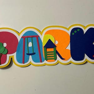 Título de álbum de recortes de parque infantil, papel hecho a mano, piezas troqueladas