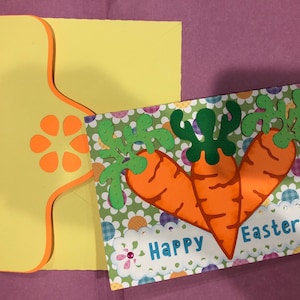 Tarjeta de zanahoria de Pascua hecha a mano con papel perforado