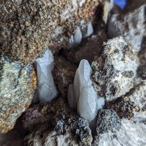 Mini Dragon Scale Black Calcite in a bed of Iridescent Chalcopyrite from Sweetwater mine -Reynolds, MO Shamanite