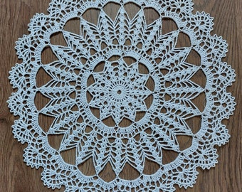 Hand crocheted white cotton doily