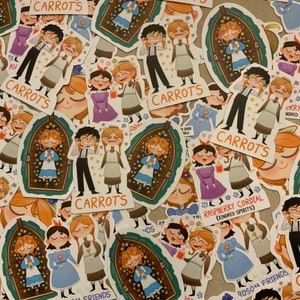May include: A collection of colorful stickers featuring cartoon characters and the words "CARROTS" and "RASPBERRY CORDIAL (KINORED SPIRITS)".