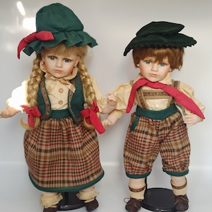 Couple de poupées en porcelaine, fillette et garçon, 60 cm 44,50
