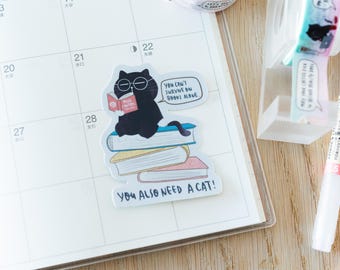 You can't survive on books alone, you also need a cat - Relatable Quote Vinyl Sticker