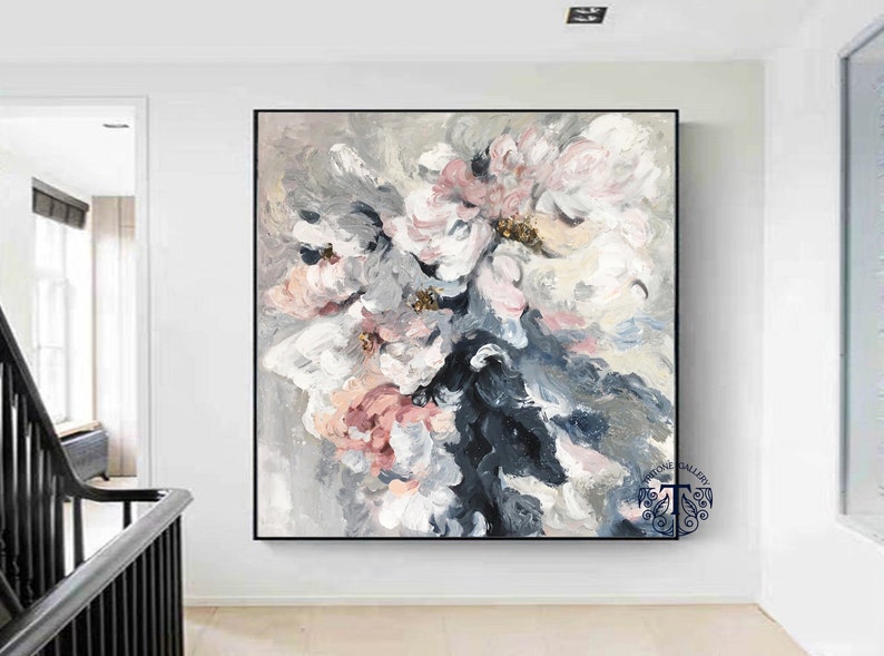 May include: Abstract floral painting with pink, white, and gray flowers on a gray background. The painting is framed in black.