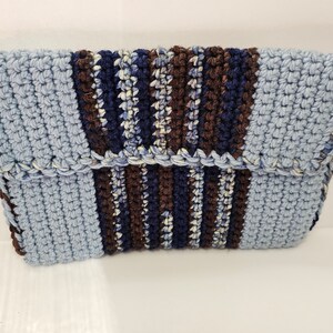 Unique and stylish crochet clutch style bag is a perfect blend of vibrant colors and classic design.