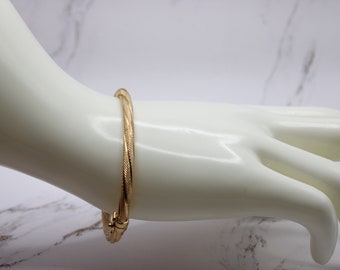 14K Yellow Gold Mesh Stamped Twist Bangle Bracelet